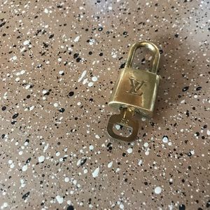 Authentic Louis Vuitton lock and key